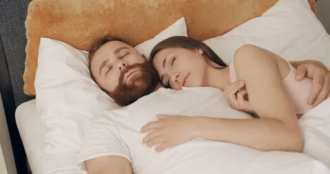 Cute couples sleeping together 