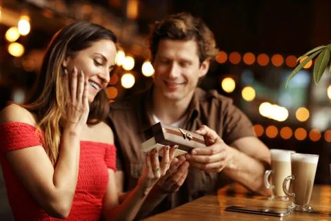 Cute couple on a date at the cafe Stock Photos