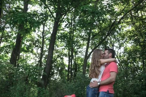 Cute couple in a forest Stock Photos