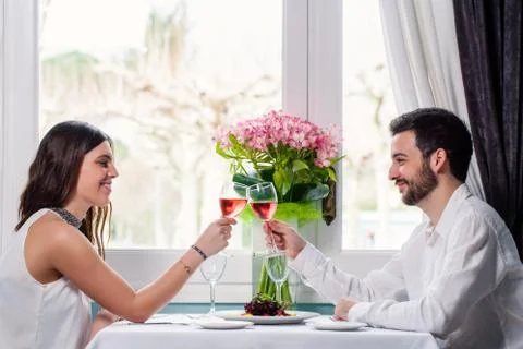 Cute couple having romantic dinner. Stock Photos