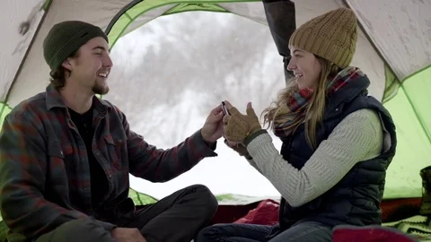 Cute Couple Take Turns Taking Photos Of Each Other Inside Camping Tent In Utah Video stock 71756455