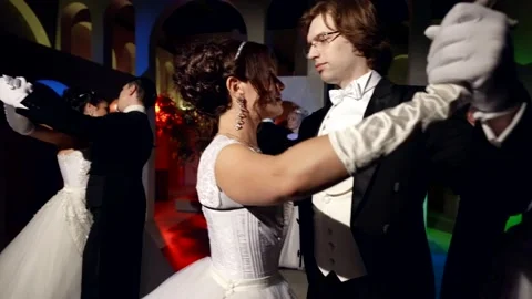 Cute couples of classical ballet dancers performing waltz moves in a castle Stock Footage 199589317