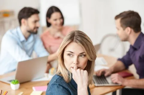 Cute creative team is sharing their ideas Stock Photos