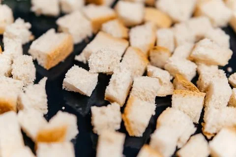 Cute cubes of white bread for salad Stock Photos