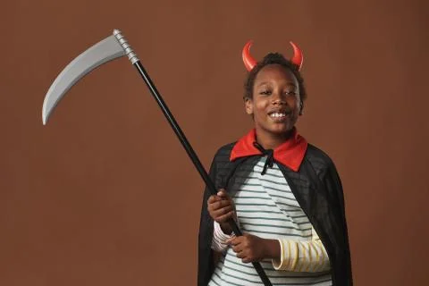 Cute Devil With Scythe Foto stock