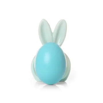 Cute dyed egg with decorative Easter bunny ears on white background Stock Photos