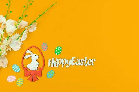 Cute easter bunny background, spring festive workspace concept with yellow of Stock Photos