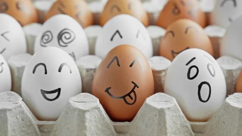 Cute easter eggs with funny faces in box. Dolly shot. Organic food. Happy, angry 스톡 동영상 303703311