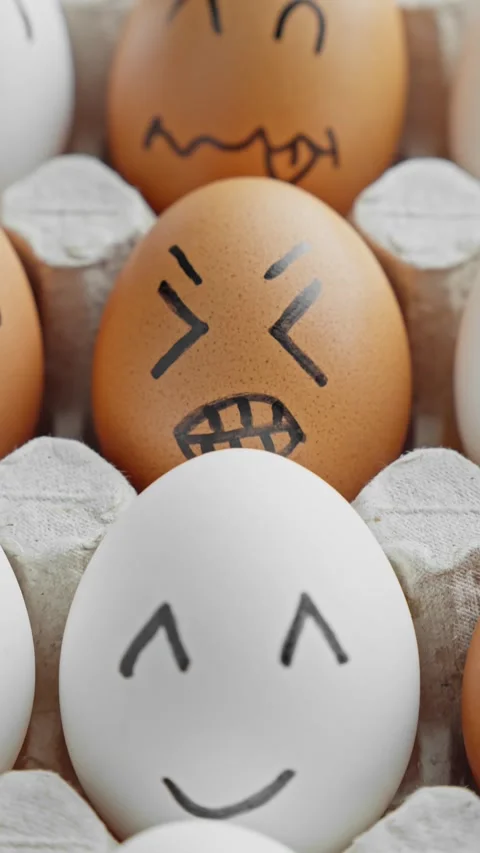 Cute easter eggs with funny faces in box. Dolly shot. Organic food. Happy, angry Stock Footage 306091401