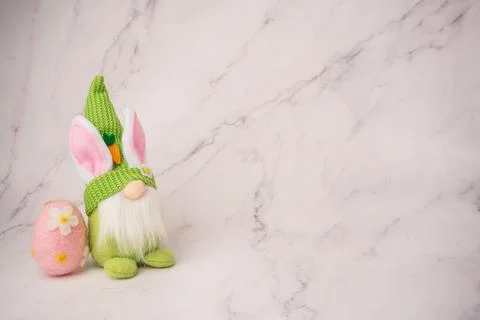 Cute Easter Gnome Bunny with Decorated Egg on White Background Stock Photos