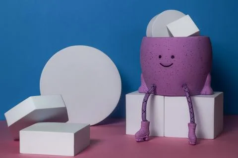Cute educational cartoon character learning shapes blocks Stock Photos