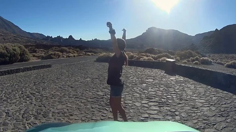 Cute female is posing under the sun Stock Footage 72183120