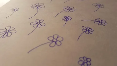 Cute floral pattern wit blue flowers on beige paper Stock Footage 239993145