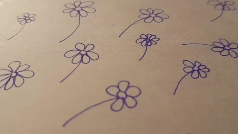 Cute floral pattern wit blue flowers on beige paper Stock Footage 239993202