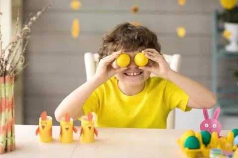 Cute funny little boy with Easter painted eggs, easter concept Stock Photos