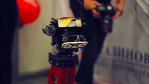 Cute Funny Machine Tacking Between Hurrying People Mass Stock-Footage 96428667