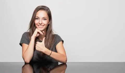 Cute gesturing brunette. Foto stock