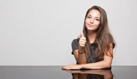 Cute gesturing brunette. Stock Photos