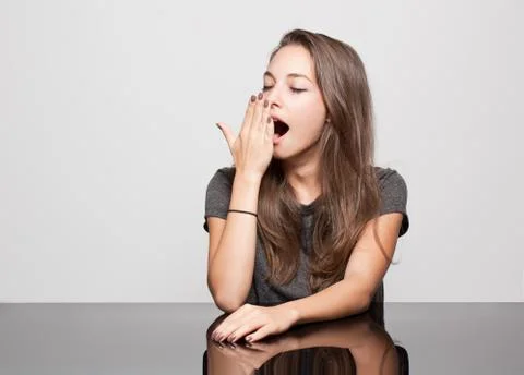 Cute gesturing brunette. Stock Photos