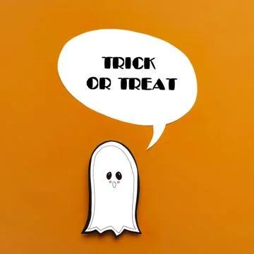 Cute ghost cartoon with speech bubble saying trick or treat Stock Photos