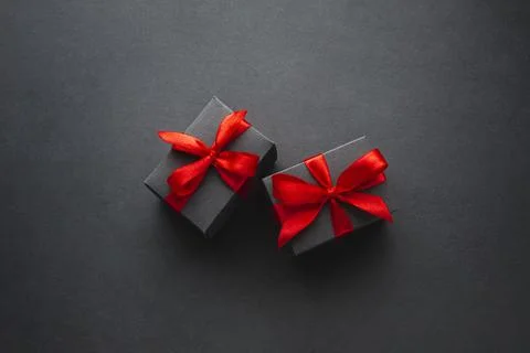Cute gift boxes black background. High quality photo Stock Photos