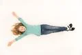 The cute girl lay on the floor. View from above Photo