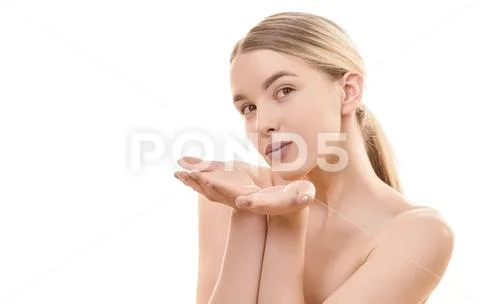 The cute girl makes an air kiss on the white background Stock Photos