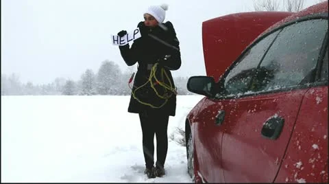 Cute girl needs help on the road Stock Footage 20441899