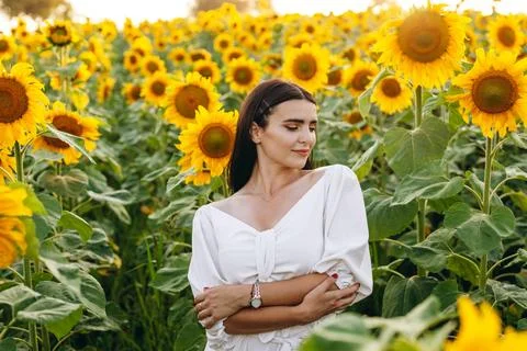 The cute girl is posing while her eyes are closed. Stock Photos
