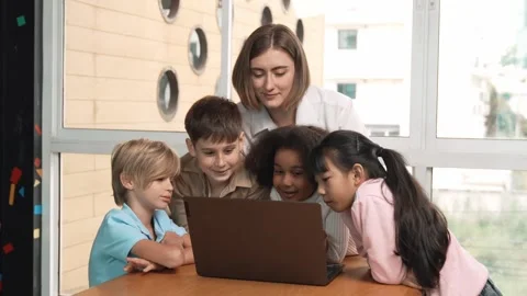 Cute girl programing system while surround with teacher and friend. Erudition. Stock Footage 274160184