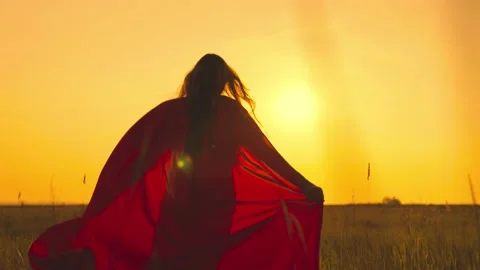 cute girl red cape plays superhero Stock Video Pond5