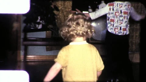 Cute Girl Spinning Children DANCING TV SET 1960s Vintage Film Old 8mm Home Movie Stock Footage