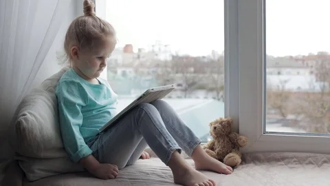 Cute girl with tablet Stock-Footage 74747396