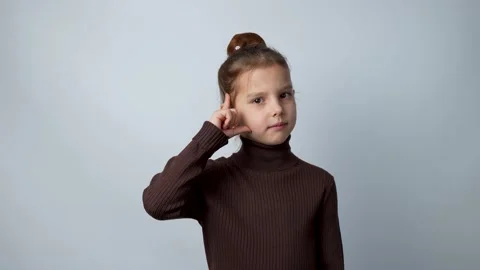 Cute girl thinking creative idea, white background Stock-Footage 238735382