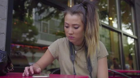 Cute girl uses tablet computer Stock Footage 54064886