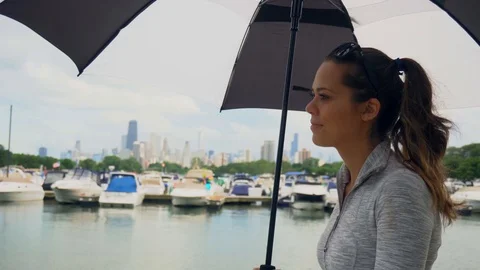 Cute Girl Walking In Harbor On Sunny Day with Umbrella In City Stock Footage
