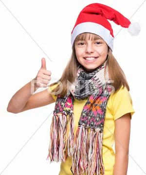 Cute girl wearing Santa Claus hat Stock Photos