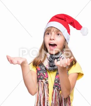 Cute girl wearing Santa Claus hat Stock Photos
