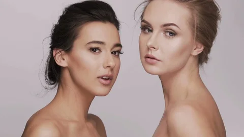 Cute girls posing at studio background Stock Footage 92696963