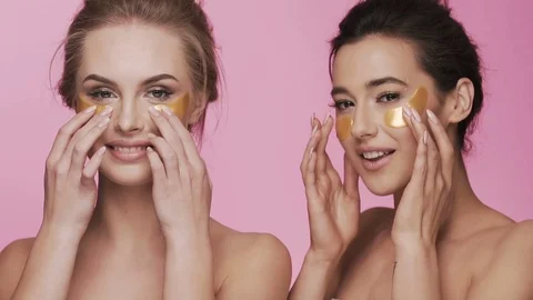 Cute girls posing at studio background Stock Footage 92705265