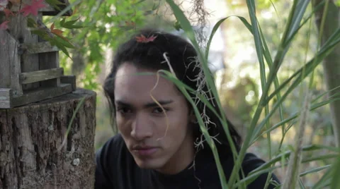 Cute guy watching from a distance, Closeup, Long Hair Stock Footage 57083066