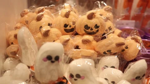 Cute Halloween pumpkin and ghost decorations displayed together for seasonal Oct Stock Footage 346305254