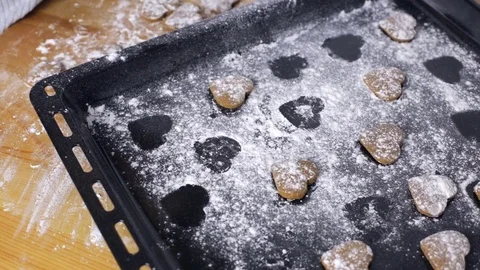 Cute hands making heart shaped cookies Video stock 82893471