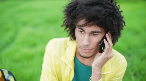 Cute, handsome boy modeling appearance, talking on the phone Stock Footage 38337293