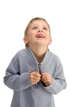 Cute happy boy looking up and expecting something wonderful Stock Photos