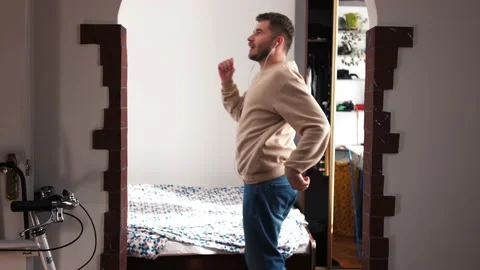 Cute happy young man dancing at home living room enjoy life funny dancer crazy Stock Footage 141209552