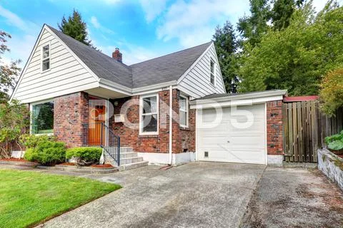 Cute house with brick trim Stock Photos
