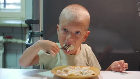 Cute Hungry Boy Happily Eating Delicious Homemade Dumplings Stock Footage 321645657