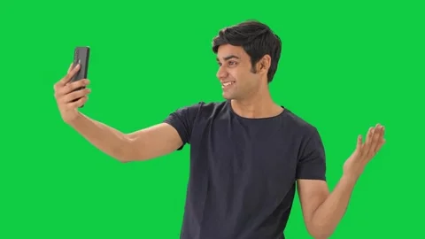 Cute Indian boy clicking selfies Green ... | Stock Video | Pond5