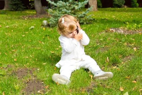 Cute infant with cellular Stock Photos